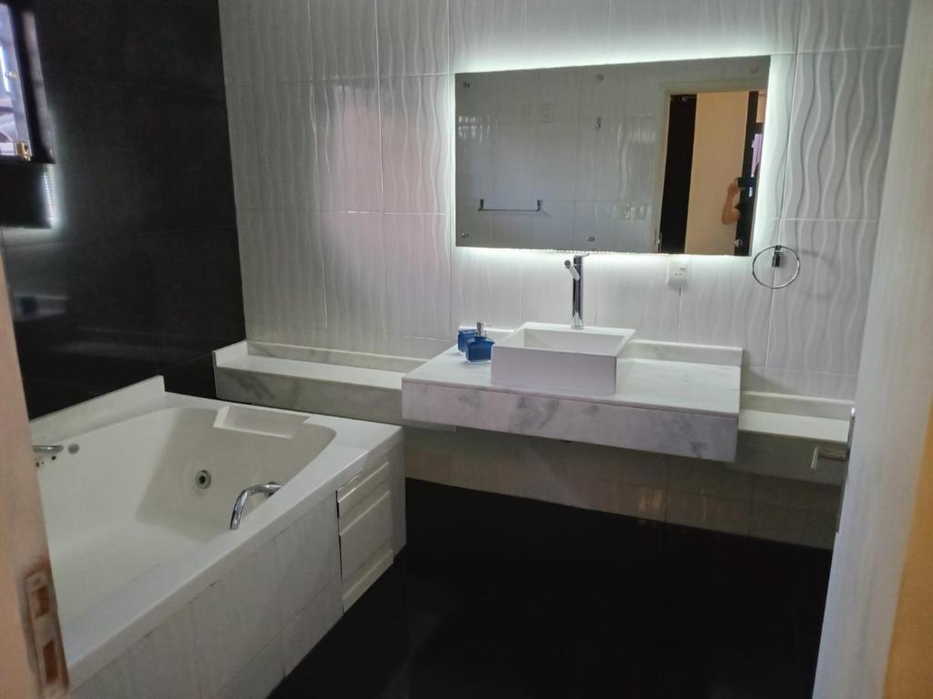 Vannas istaba naktsmītnē Hotel FG