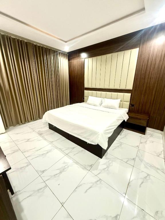 Llit o llits en una habitació de شاليهات الغيم