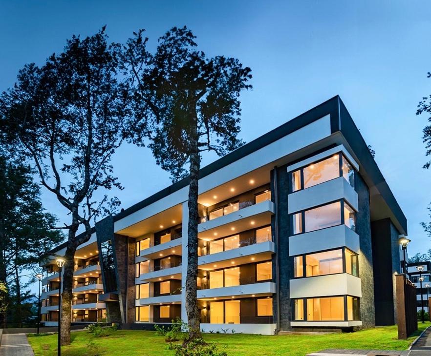 a large apartment building with lights on at Excelente, Exclusivo Depto en Pucón in Pucón