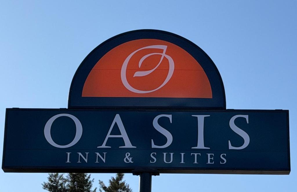 a sign for a fast food restaurant at Oasis Inn and Suites in Fallon