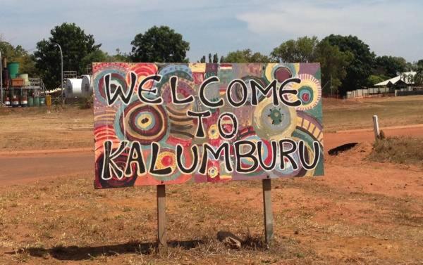 a sign that says welcome to kalaminion on the side of a road at Coconut Lodge in Kalumburu