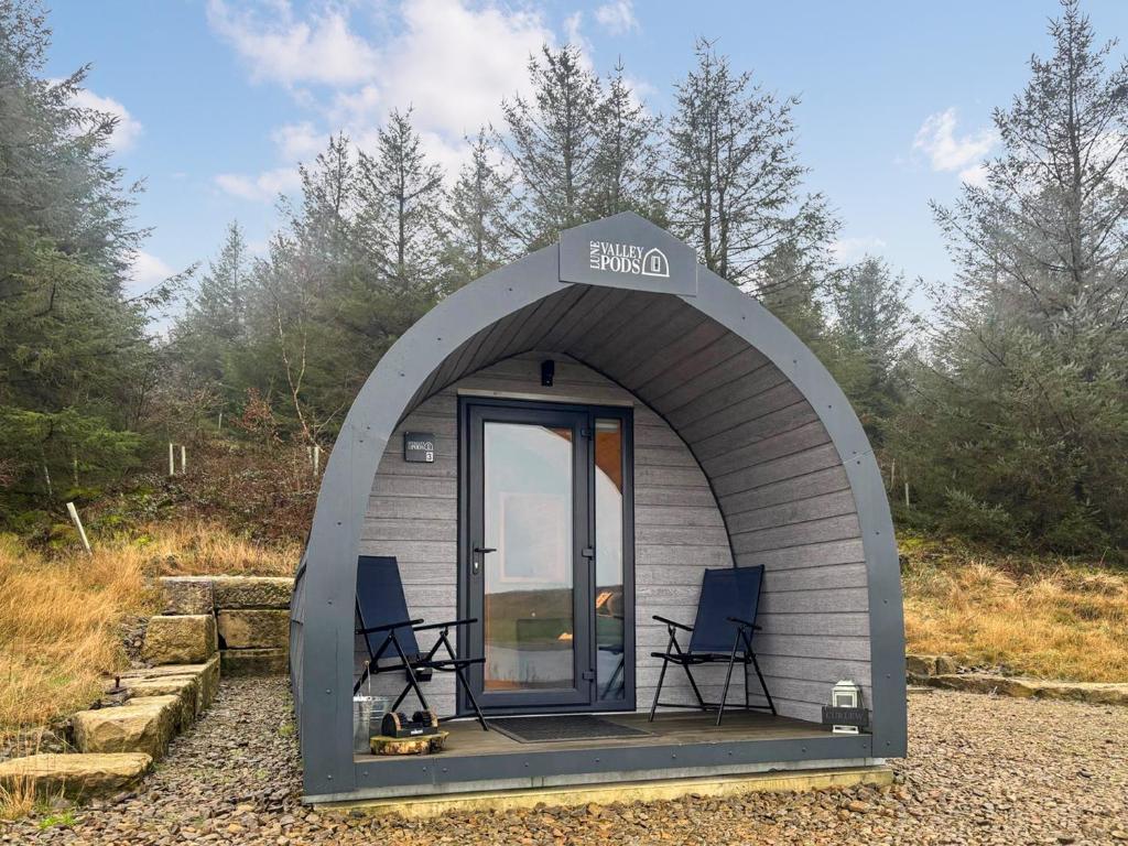 a small dome tent with two chairs in it at Curlew - Uk51340 in Draughton