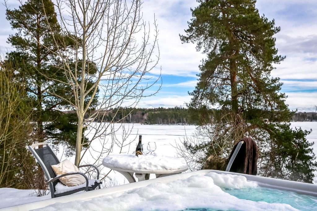 Lakefront Spa Villa with Hot Tub and Private Dock