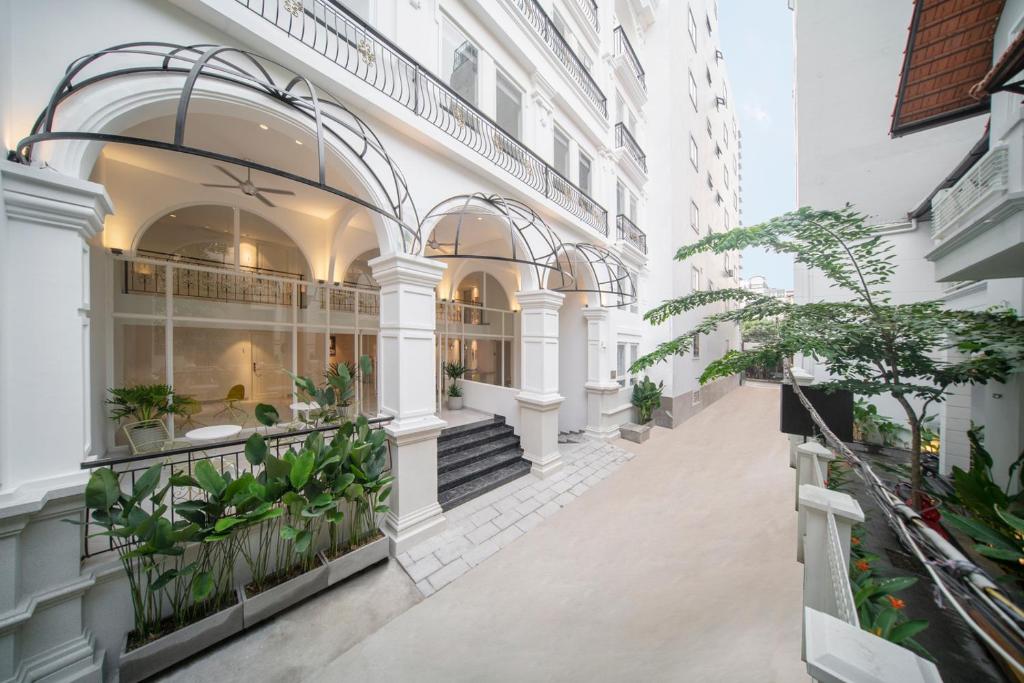 a building with plants on the side of it at Express by M Village Cửu Long, a brand of Modern Village Lifestyle in Ho Chi Minh City