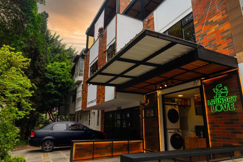 a car parked in front of a building at NOVA Apartahotel in Medellín