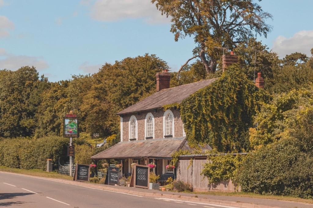an old church on the side of the road at The Ivy House in Chalfont Saint Giles