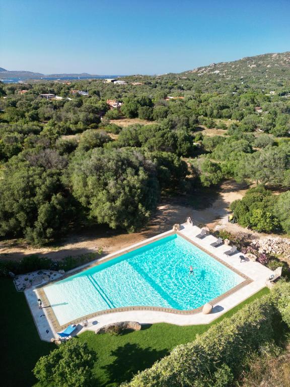 an aerial view of a swimming pool in a resort at My Opera Private Pool by Sarda Bella in Rudalza