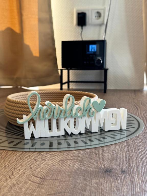a sign that says kovenantil willwayne on the floor at Seequartier Borken in Borken