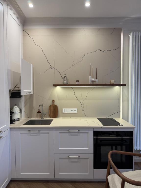 FID B' Home - Studio Élégance Haussmannienne – photo 19