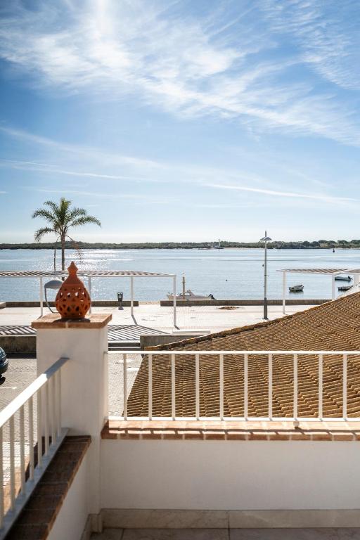 a view of the beach from the balcony of a house at Cornise in El Rompido