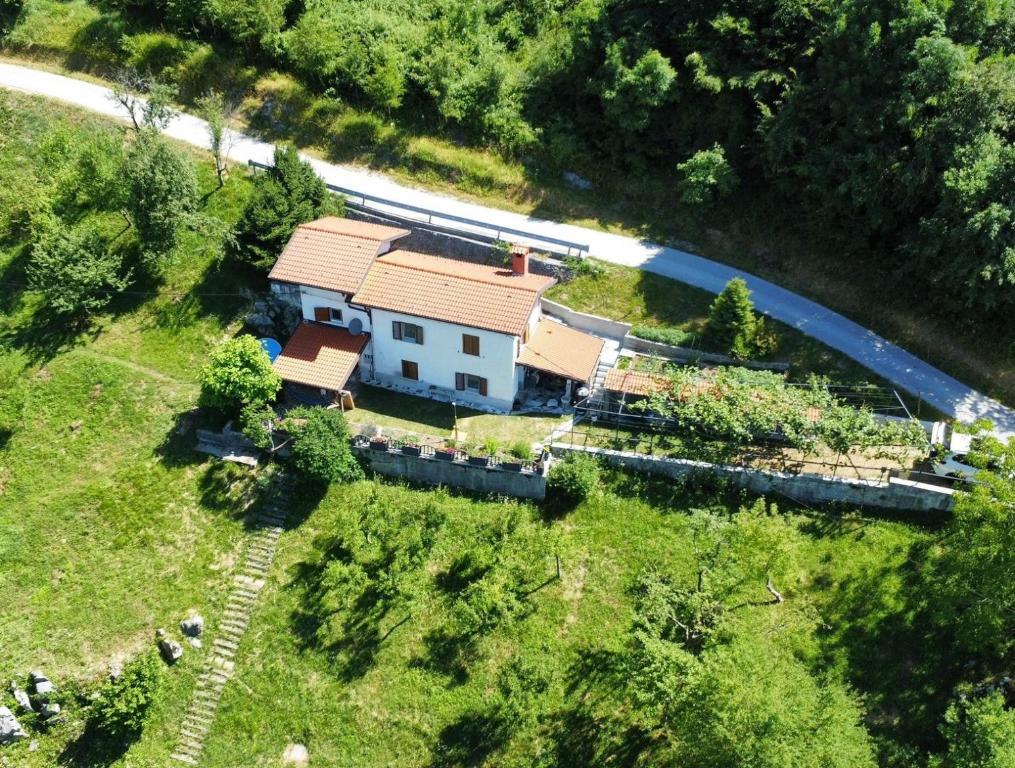 an aerial view of a house with a train at Apple & Pear in Ročinj