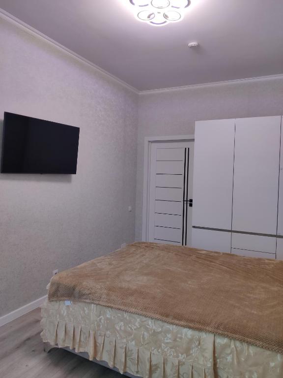 Llit o llits en una habitació de Oasis