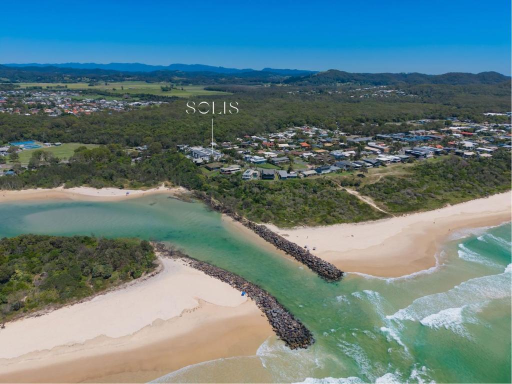 an aerial view of a beach with a resort at Solis Villa in Pottsville