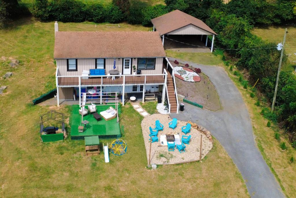 an overhead view of a house with a playground at Family Mountain Escape l Views l Near Homestead in Hot Springs