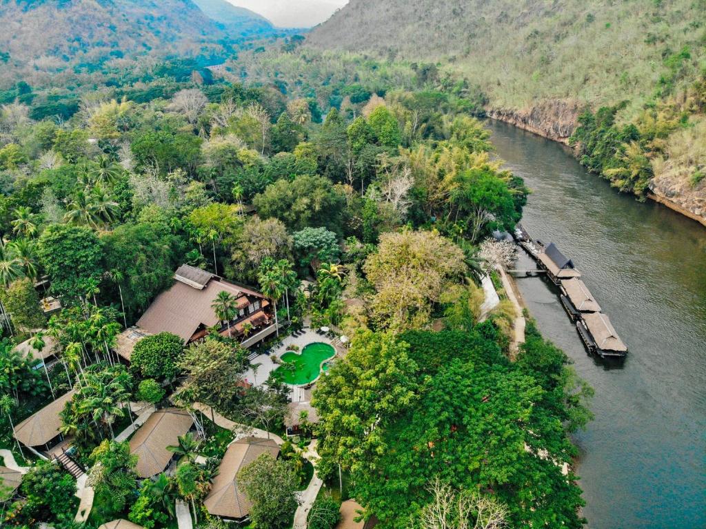 an aerial view of a resort next to a river at River Kwai Resotel in Sai Yok
