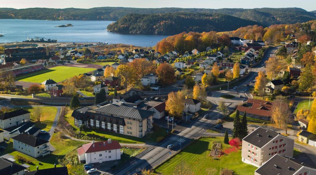 an aerial view of a small town next to a lake at Home Hotel Park in Halden