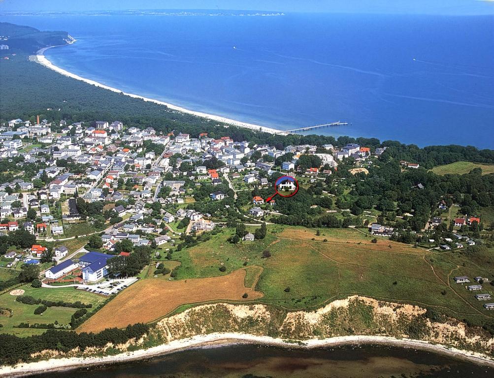 an aerial view of a city and the ocean at Ferienwohnungen Meerblick Herde in Göhren