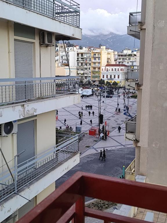 a view of a city from a balcony of a building at Parastaseis One Bedrooom Flat Georges Square in Patra