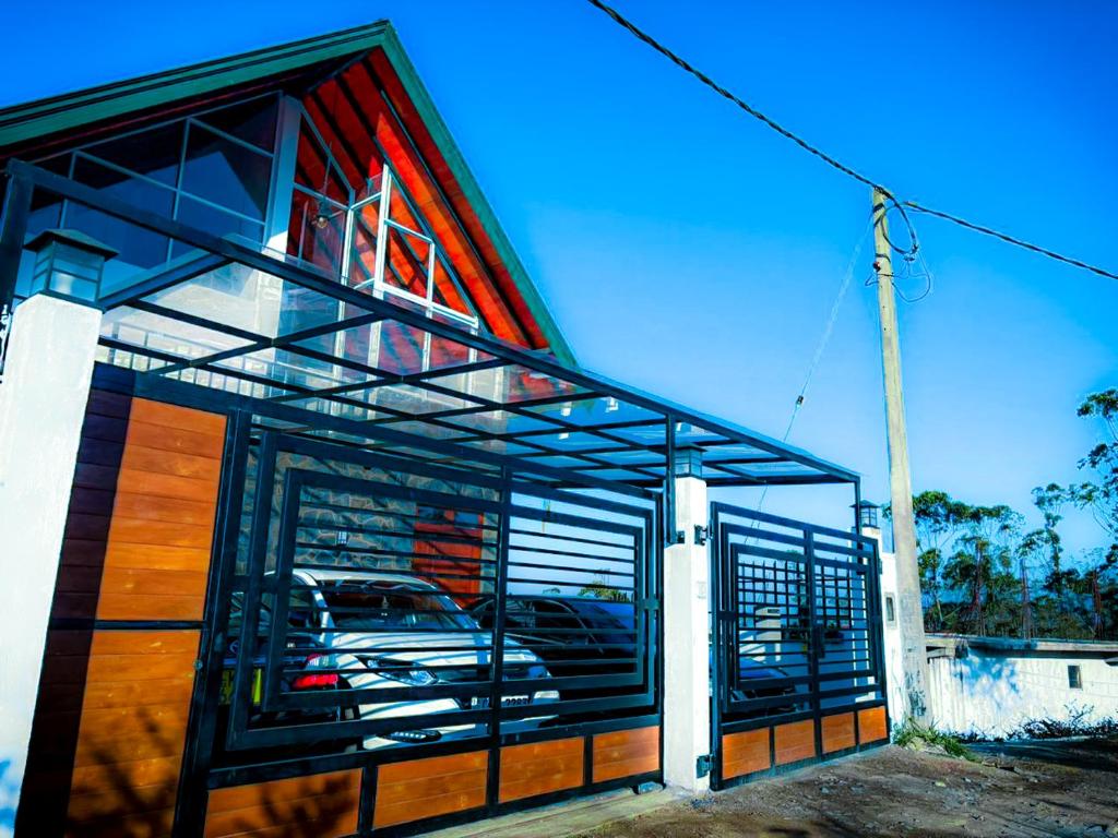a building with a car parked inside of it at The Misty Crown in Hatton