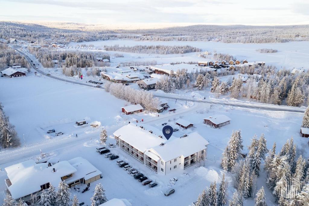 an aerial view of a resort in the snow at Sivulantie 4 109 by Holiday in Lapland in Äkäslompolo