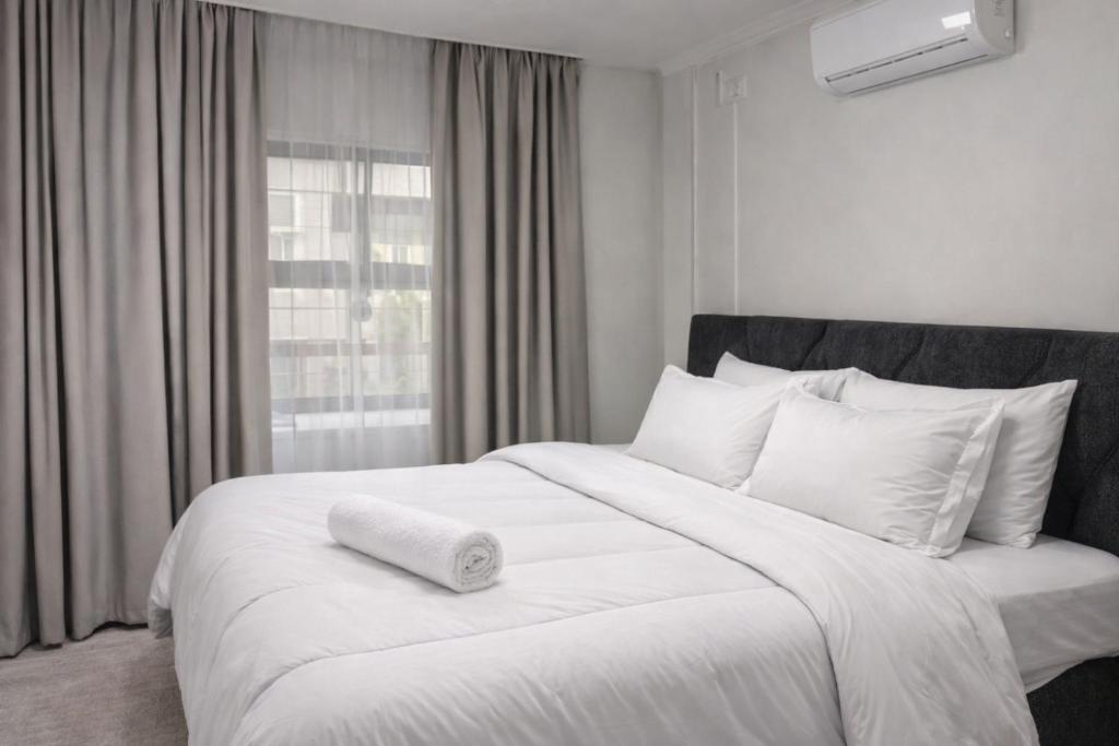 Krevet ili kreveti u jedinici u objektu SouthSide Apartment