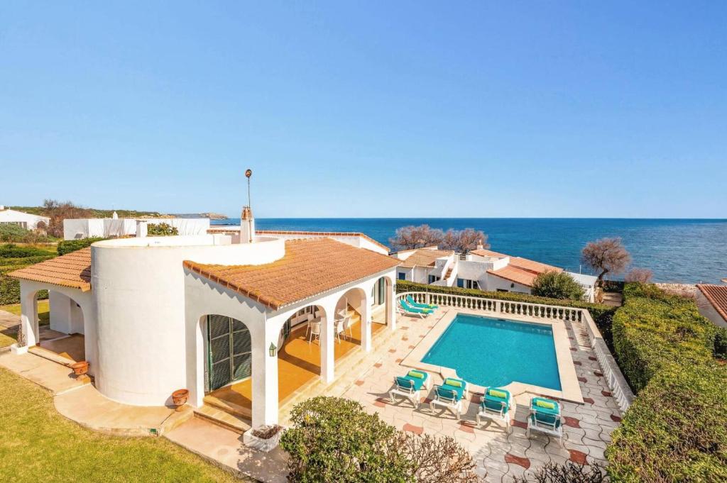 an aerial view of a house with a swimming pool at Villa Caprice by Villa Plus in S'Algar