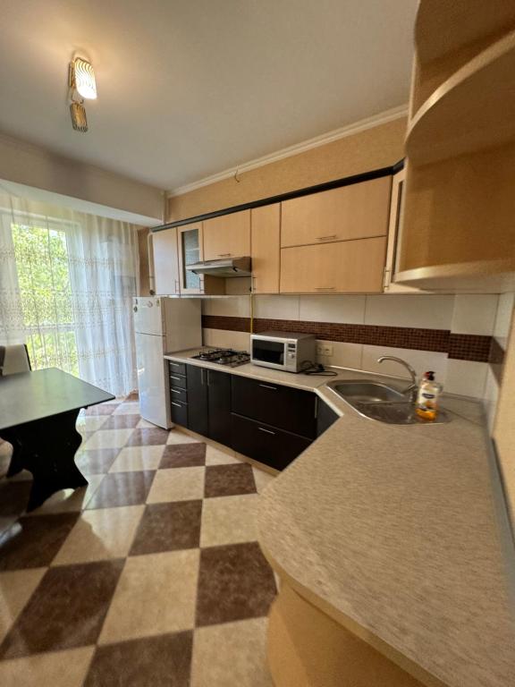 Kuchyň nebo kuchyňský kout v ubytování Rio apartment