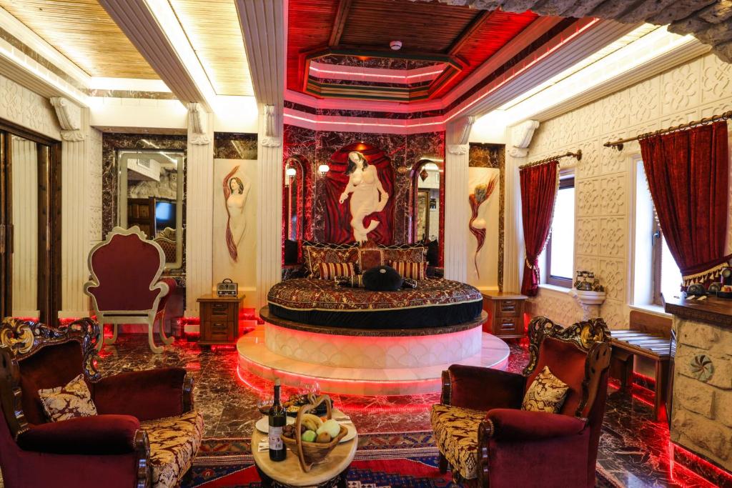 a room with a large room with a fountain in it at Kapadokya Hill Hotel & Spa in Nevşehir