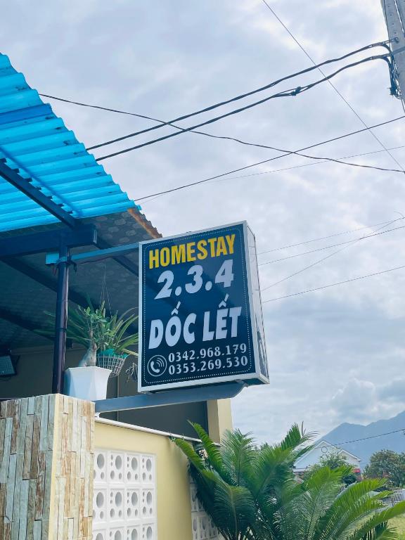 a sign for a dog let on a house at Homestay 234 Dốc Lết in Ba Ha