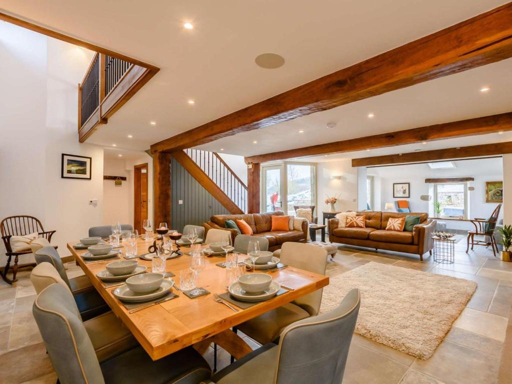 a dining room with a table and chairs at 5 Bed in Lancaster oc-90546 in Burton in Lonsdale