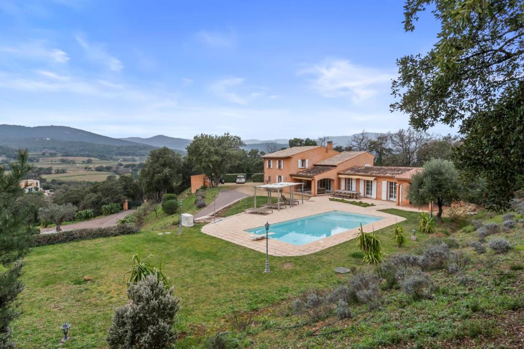 an estate with a swimming pool and a house at Villa Olivia - Golfe de Saint-Tropez in Cogolin