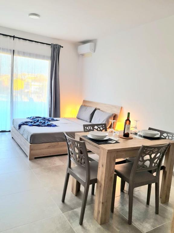 Llit o llits en una habitació de Praça do Presidente