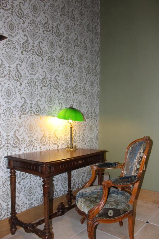 Posezení v ubytování Ferme-Château de Cordey & Spa