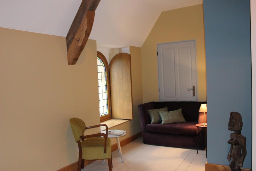 Posezení v ubytování Ferme-Château de Cordey & Spa