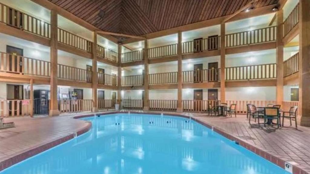 a large swimming pool in a large building at FairBridge Inn & Suites Spearfish in Spearfish