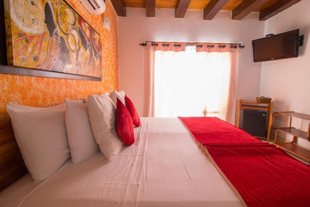 Postel nebo postele na pokoji v ubytování Hotel 3 Banderas