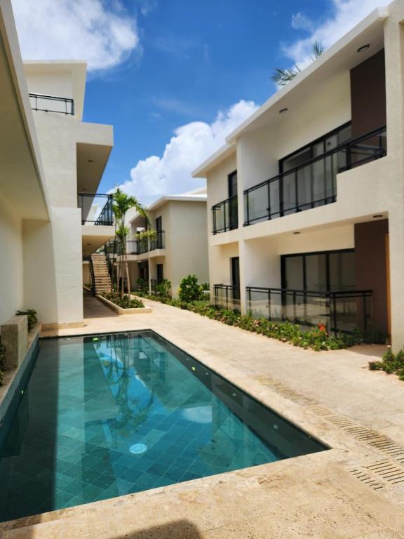 an image of a villa with a swimming pool at Luxury Penthouse, Pool, Bbq, Private Terrace in Pueblo Bavaro