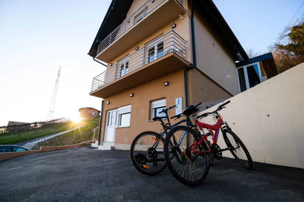 a couple of bikes parked next to a building at Kuća za odmor Aria in Krapina