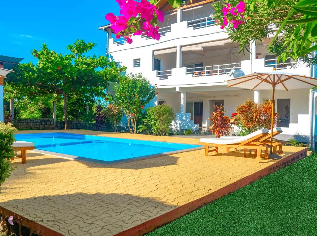 Piscina a Nosy Villa o a prop