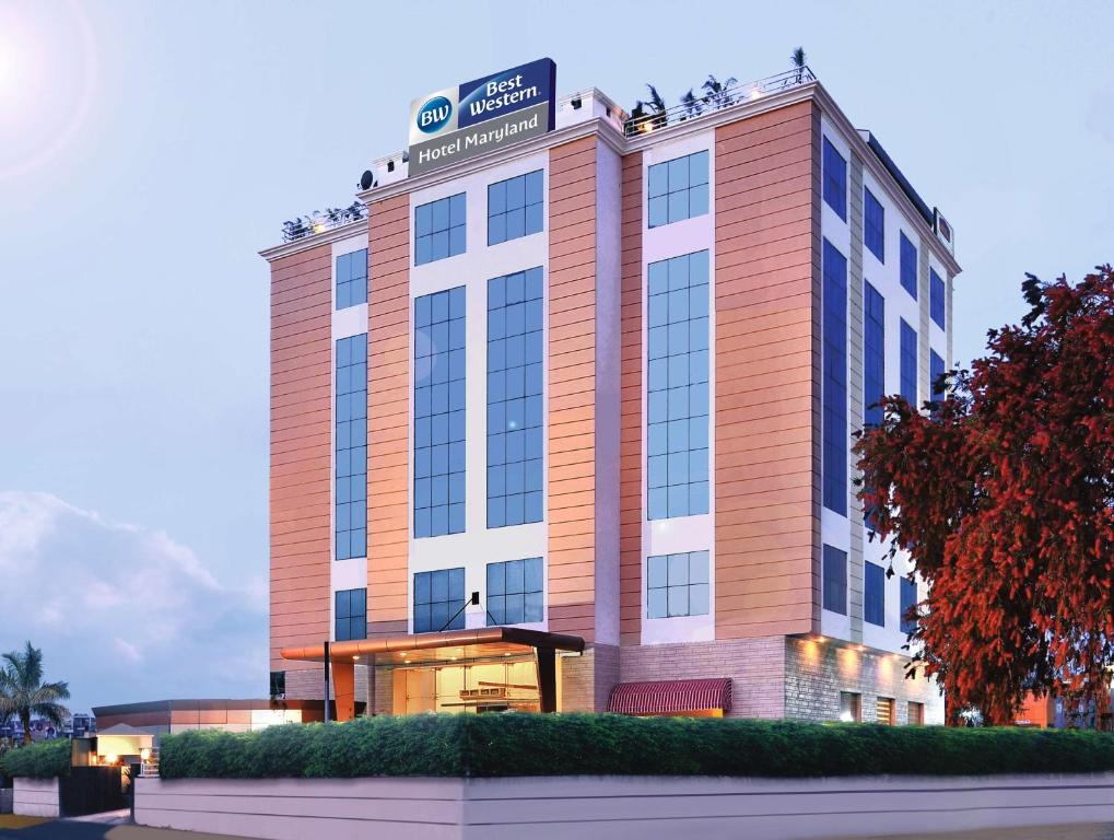 a hotel building with a sign on top of it at Best Western Maryland in Chandīgarh