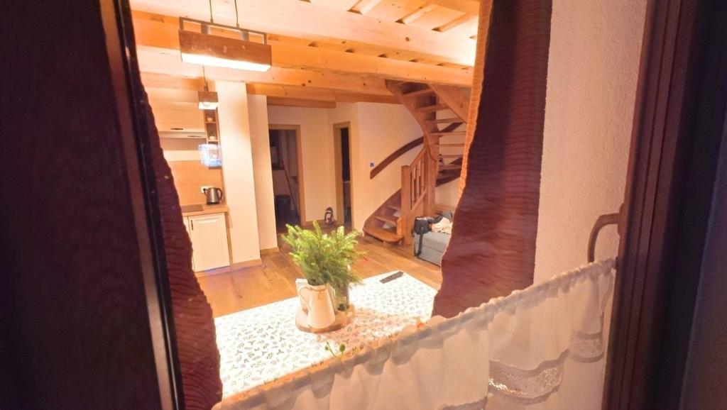 a view of a living room from a hallway at Chata Relax 1 in Pribylina