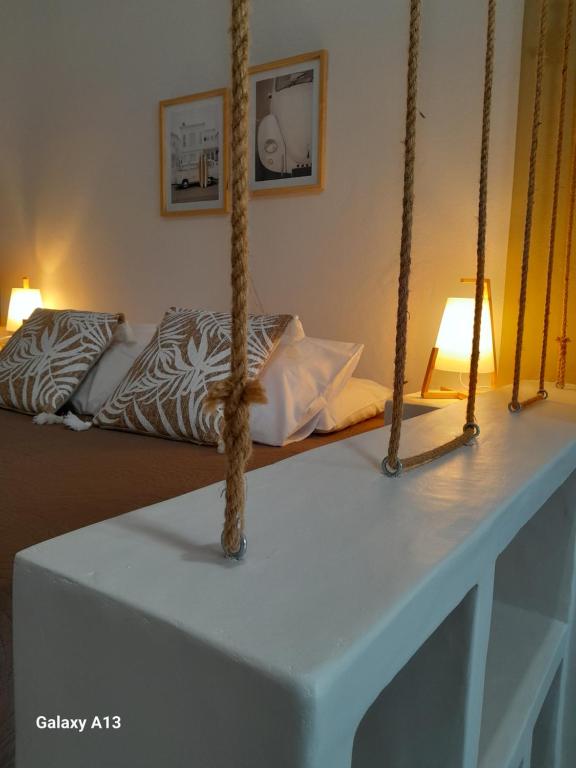 a table with ropes on it in a room at Overhill Apartments Adamas in Adamantas