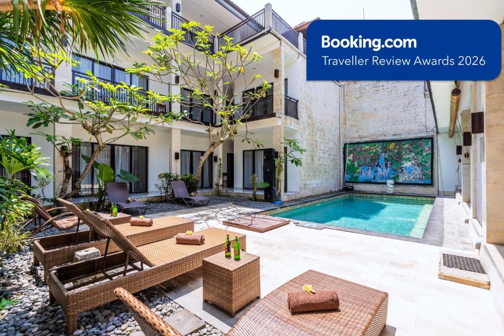 a villa with a swimming pool in a building at Balian Paradise Hotel in Selemadeg