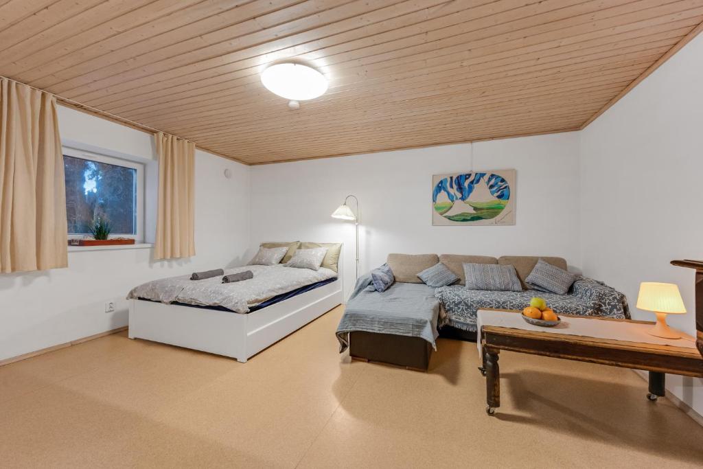 Llit o llits en una habitació de Studio with sauna