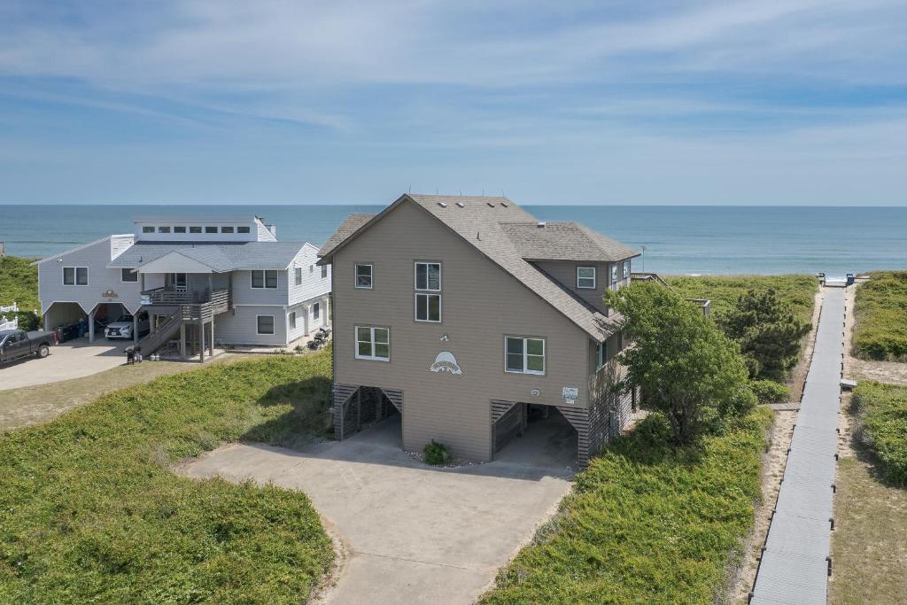 an aerial view of a house and the ocean at 2931 - Lighthouse in Duck