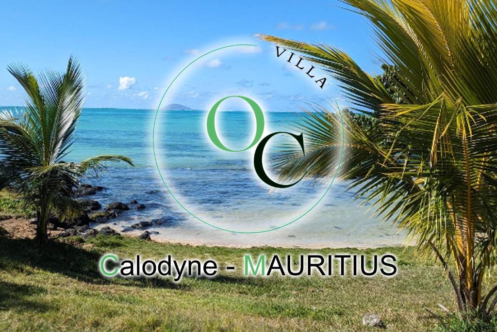 a picture of a beach with the words alodaime maritimus at OC Villa in Calodyne