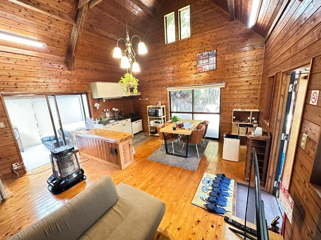 an overhead view of a living room and kitchen in a cabin at Mori Vila Aso in Takamori