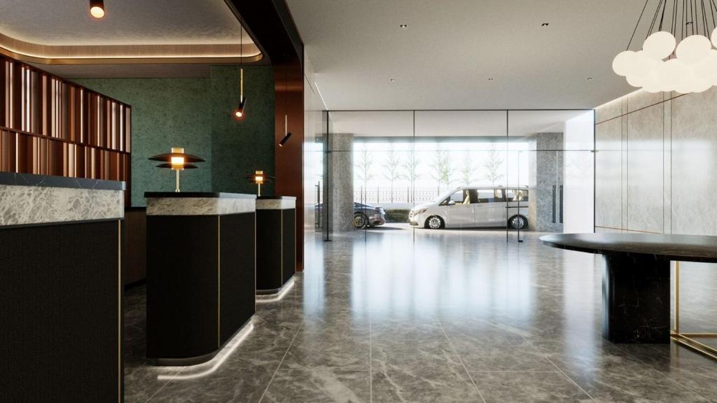 a lobby with a van parked in a parking lot at Brisdale International Kuala Lumpur in Kuala Lumpur