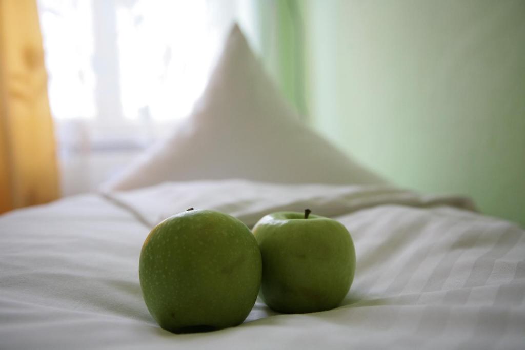 Postel nebo postele na pokoji v ubytování Hotel-Pension Adamshof