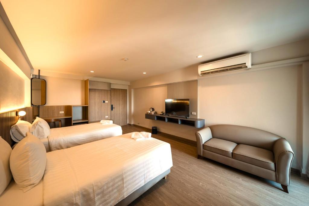 Mintara Hotel - โรงแรมมินธารา มีนบุรี - Deluxe Tweepersoonskamer Met 2 Aparte Bedden